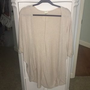 Tan Tilly’s cardigan